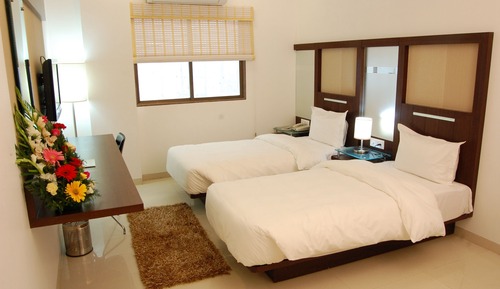 Habitación Business con 1 cama doble o 2 individuales