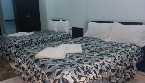 Habitación cuádruple Deluxe