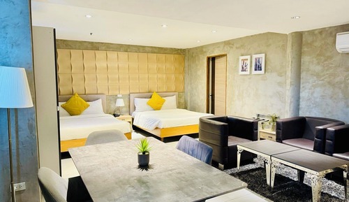 Habitación Signature con 1 cama doble o 2 individuales