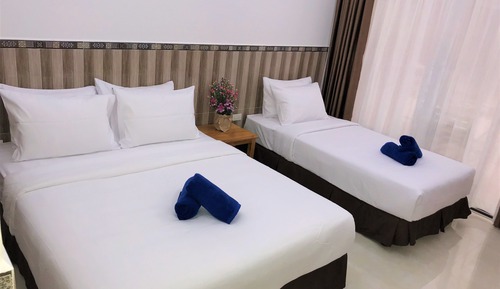 Habitación triple estándar, vistas al jardín