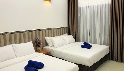 Habitación cuádruple estándar, vistas al jardín