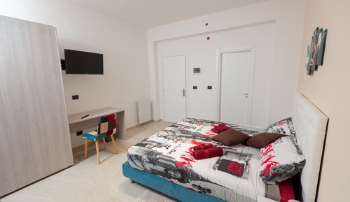 Habitación triple, 1 cama de matrimonio con sofá cama (Zaffiro)