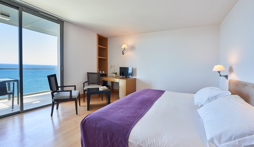 Habitación con 2 camas individuales, vistas al mar