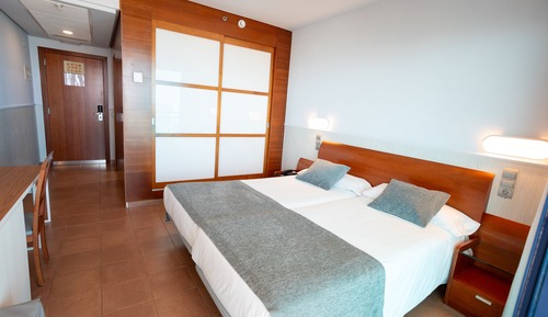 Habitación Doble con 2 camas (2 adultos + 1 niño)