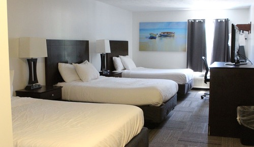 Habitación triple (3 Queen Beds)