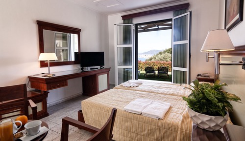 Habitación triple, vistas al mar
