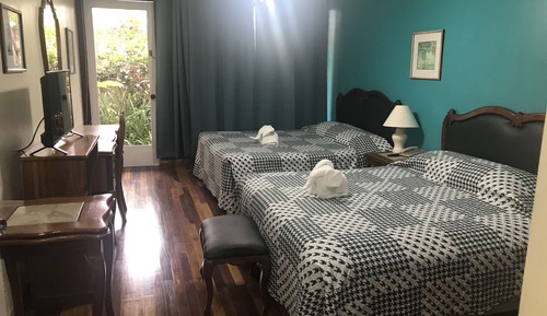 Habitación individual superior, 2 camas de matrimonio, patio, vistas al jardín