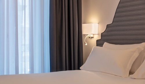 Habitación Deluxe con 1 cama doble o 2 individuales, vistas a la ciudad