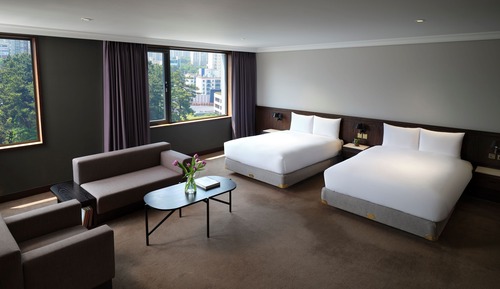 Suite, 2 camas dobles, en esquina