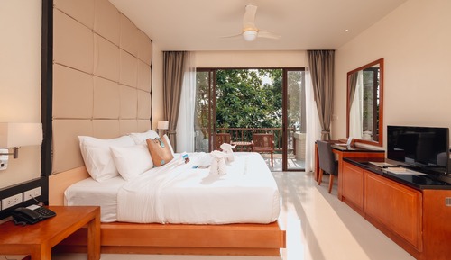 Habitación junior, 1 cama de matrimonio grande, vistas al jardín