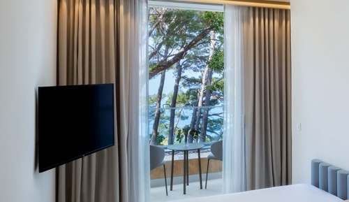 Habitación clásica doble, balcón, vistas parciales al mar