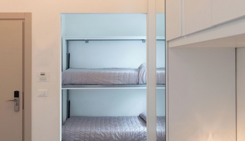 Habitación triple, vistas parciales al mar