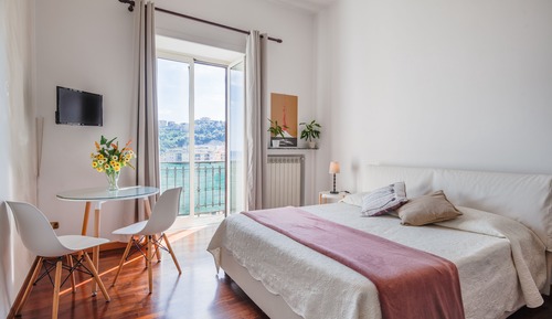 Habitación triple panorámica, varias camas, vistas al mar