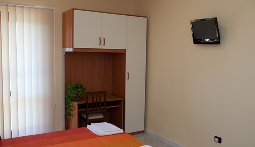 Habitación triple, vistas al mar