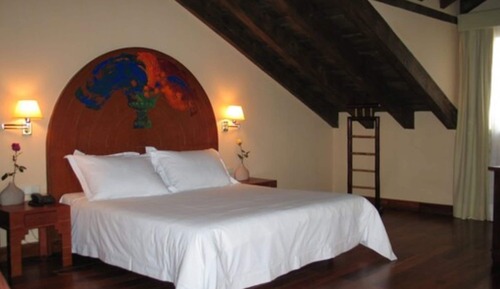 Habitación superior con 1 cama doble o 2 individuales