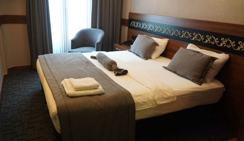 Habitación estándar con 1 cama doble o 2 individuales
