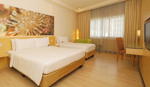 Habitación triple ejecutiva, varias camas