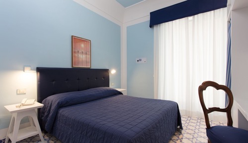 Habitación estándar con 1 cama doble o 2 individuales