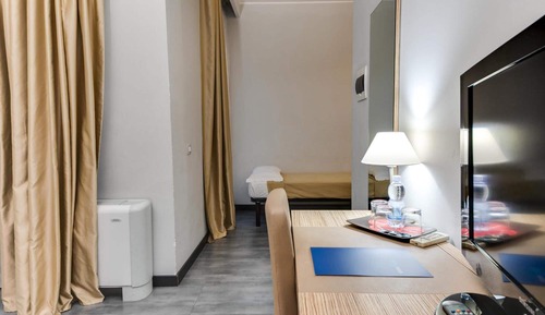 Habitación cuádruple, varias camas