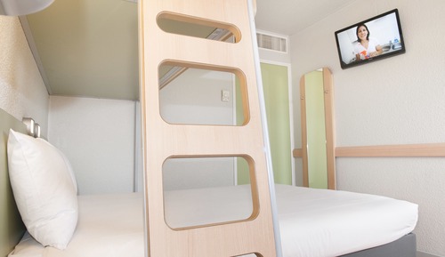 Habitación triple, varias camas