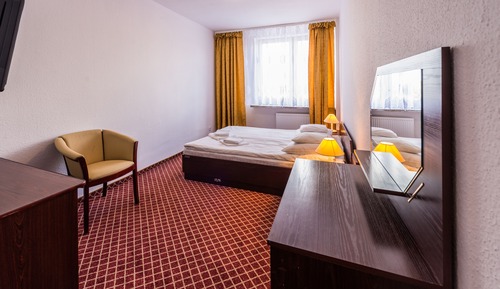 Habitación estándar con 1 cama doble o 2 individuales