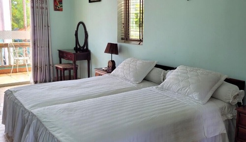 Habitación Confort con 1 cama doble o 2 individuales