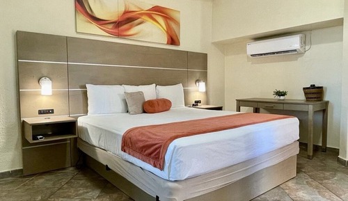 Habitación individual Deluxe, 1 cama de matrimonio grande, frigorífico y microondas, vistas al mar