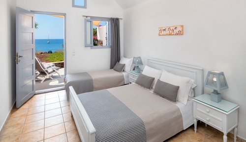 Habitación triple, vistas al mar