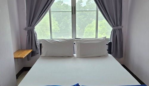 Habitación estándar con 1 cama doble o 2 individuales