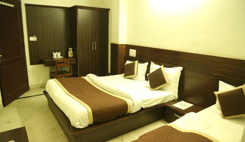 Habitación triple Deluxe, varias camas, no fumadores