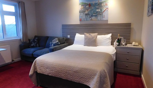 Habitación Deluxe doble, 1 cama doble con sofá cama, vistas al jardín
