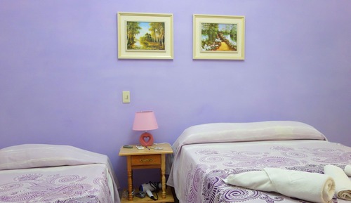 Habitación junior con 1 cama doble o 2 individuales