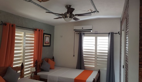 Habitación superior con 1 cama doble o 2 individuales