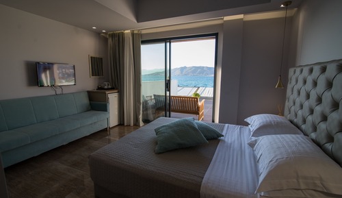 Habitación triple, balcón, vistas al mar