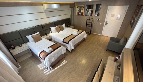 Quarto Luxo Triplo, tipo de camas