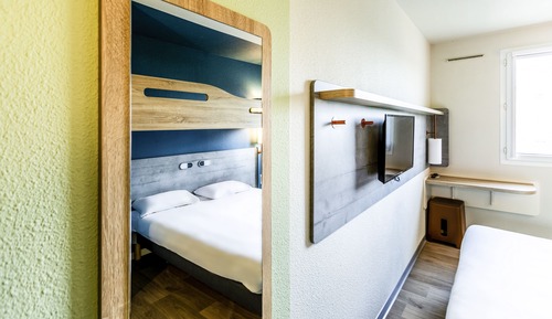 Habitación triple, varias camas