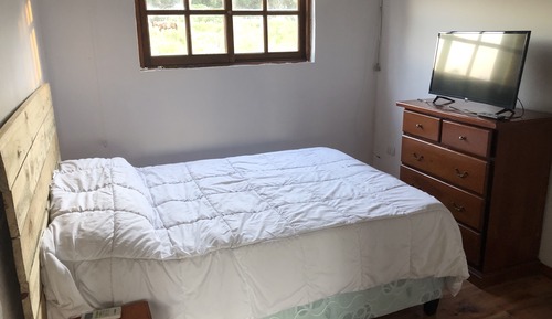 Habitación familiar, varias camas, vistas al jardín