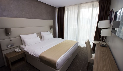 Habitación Deluxe con 1 cama doble o 2 individuales, balcón