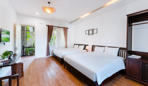 Habitación cuádruple Deluxe, vistas al jardín