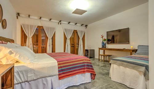 Suite Deluxe, varias camas, no fumadores, vistas a la piscina