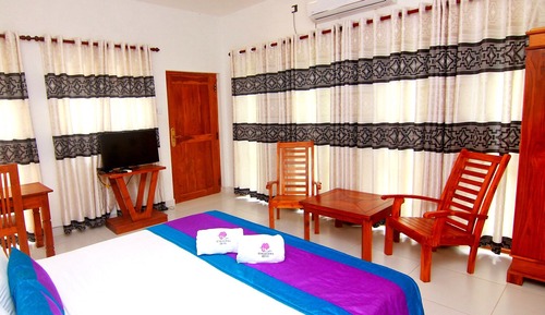 Habitación triple Deluxe