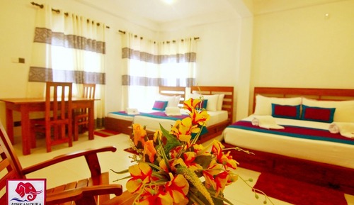 Habitación familiar, varias camas, no fumadores, vistas al jardín