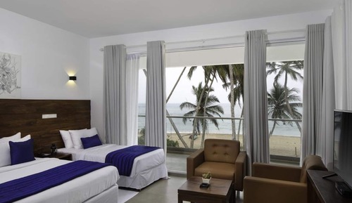 Habitación triple Deluxe, 1 cama de matrimonio grande, bañera, vistas al mar