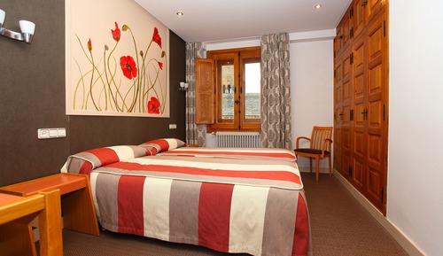 Habitación con 2 camas individuales