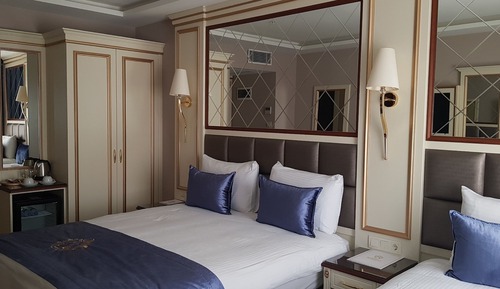 Habitación triple Deluxe, varias camas, no fumadores