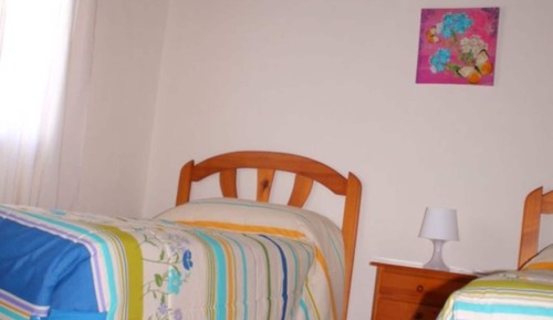 Casa familiar, varias camas, no fumadores, vistas al jardín