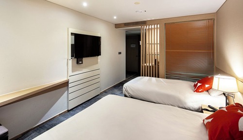 Habitación Deluxe con 2 camas individuales, varias camas, vistas a la ciudad