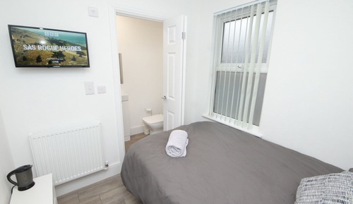 Habitación doble de uso individual, 1 cama individual grande, baño privado