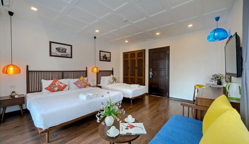 Habitación triple de lujo, varias camas, vistas al jardín
