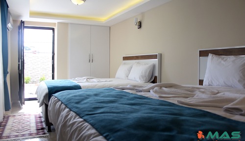 Habitación triple, vistas al jardín